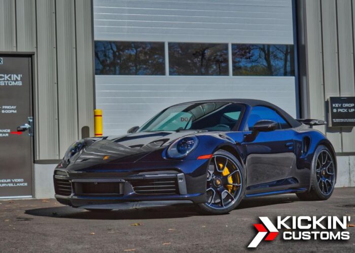 XPEL paint protection film installed on a black Porsche 911 Turbo S at Kickin' Customs in Raynham, MA XPEL paint protection film installed on a black Porsche 911 Turbo S at Kickin' Customs in Raynham, MA.