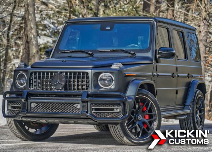 XPEL PPF Rivian R1T Side Profile Side view of Rivian R1T with paint protection film applied, inside Kickin' Customs' PPF bay.