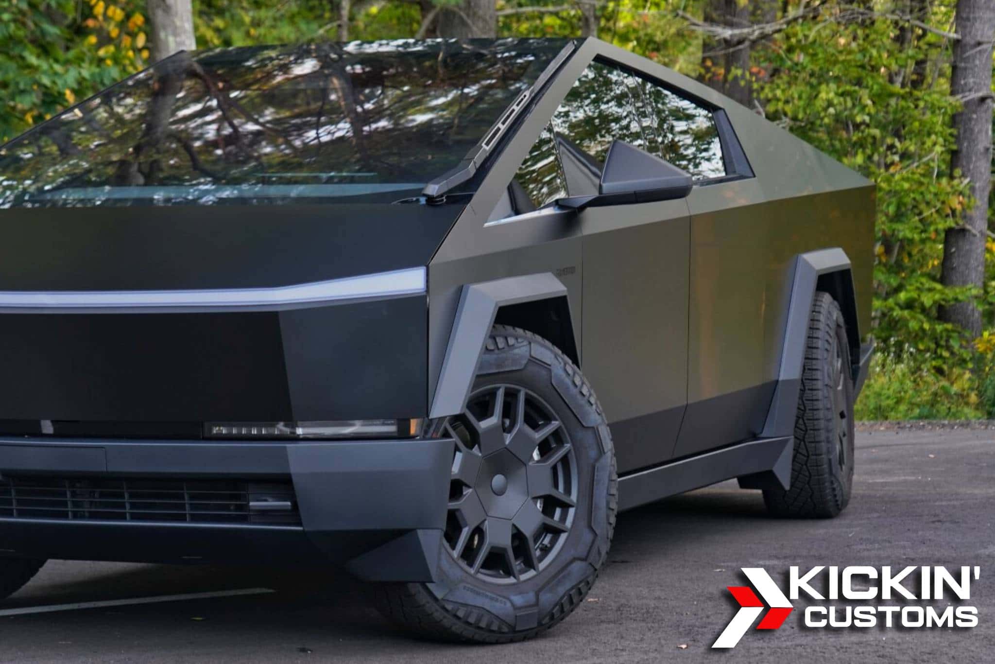 Tesla Cybertruck with colored paint protection film installed by Kickin’ Customs near Auburn MA.