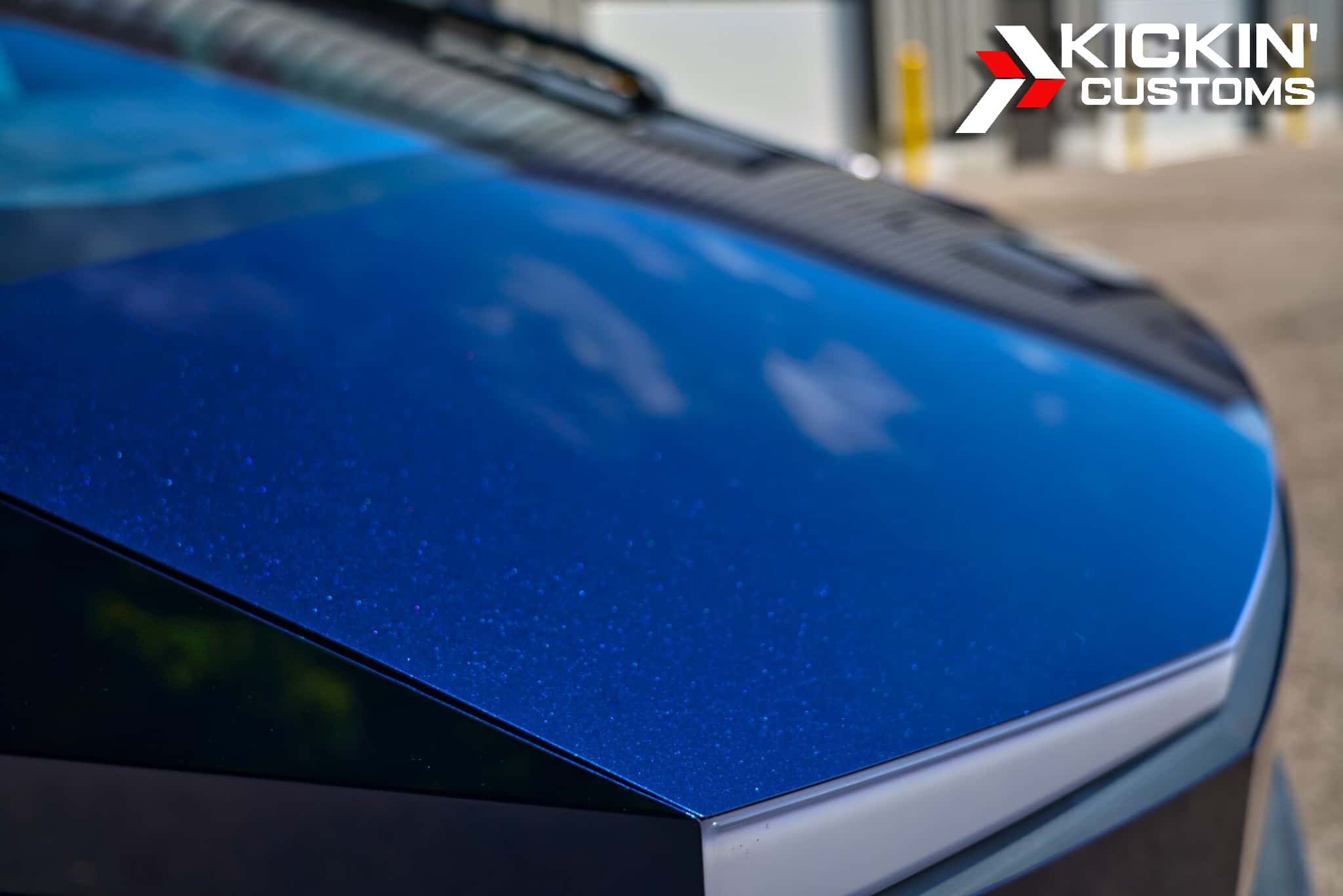 tesla-cybertruck-tanzblue-pure-color-ppf-closeup-carver-ma Pure PPF Tanz Blue wrap detail — eye-catching protection for a Cybertruck owned by a Carver client