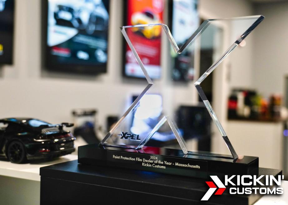 Award photo recognizing Kickin’ Customs as 2024 XPEL Dealer of the Year, trusted by Saugus MA drivers.