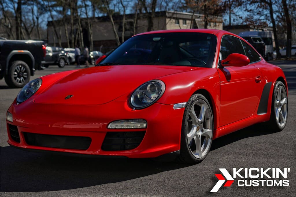 guards-red-vinyl-wrap-porsche-911 Porsche 911 finished in guards red vinyl wrap for a timeless, factory-inspired look.